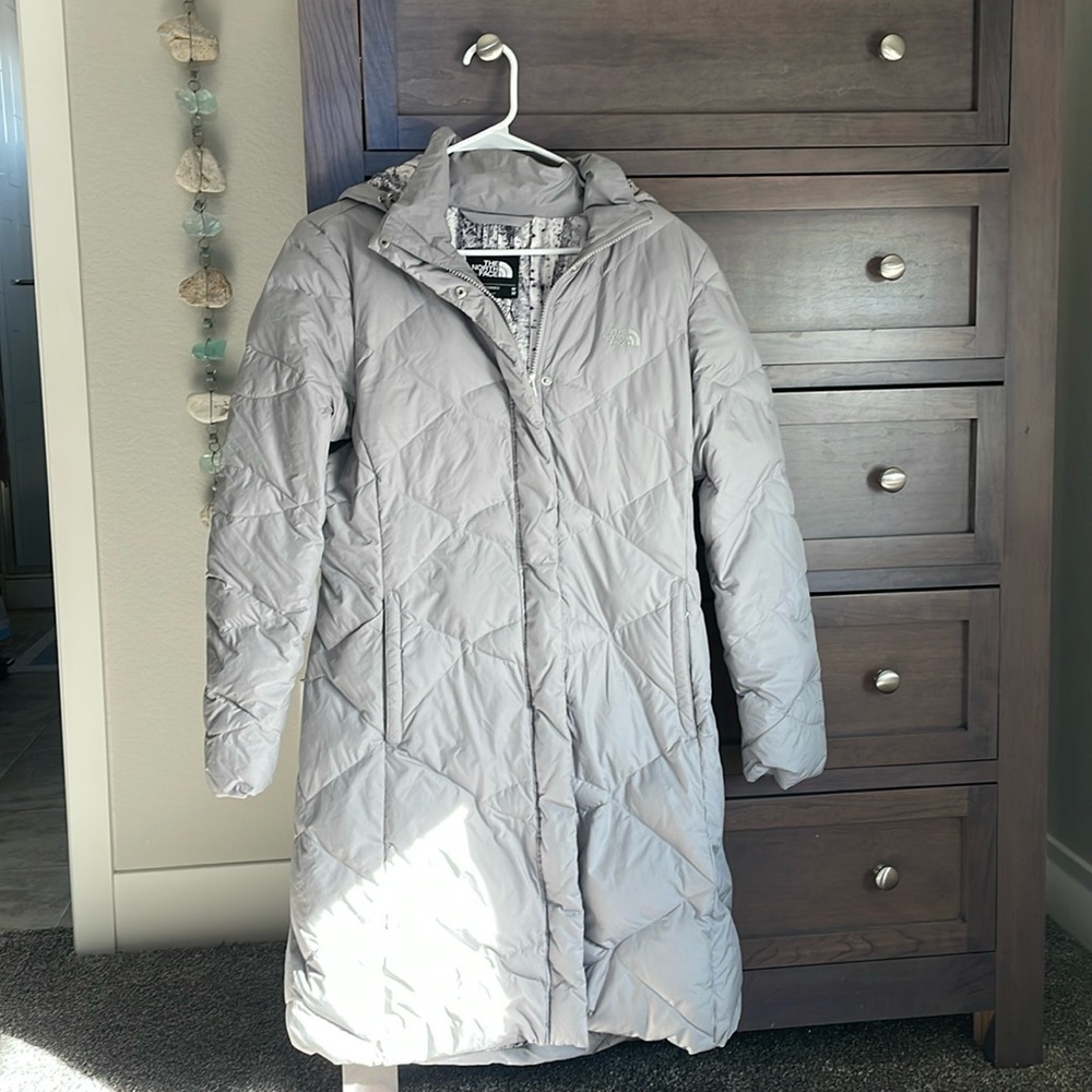 The North Face thigh-length women’s winter coat